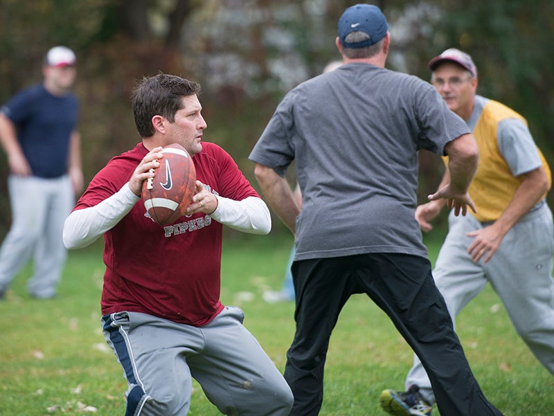 The Turkey Bowl follows some of the rules of touch football, with a few twists added in. Players can pass anywhere — forward or backward — once they've passed the line of scrimmage. - Colleen Harrison/Albert Lea Tribune