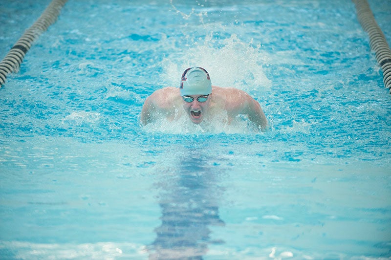 Albert Lea’s Aaron Zogg swims in the 100-yard fly during Thursday’s meet against Rochester Mayo in Albert Lea. Zogg came in fourth place with a time of 1:04.26.