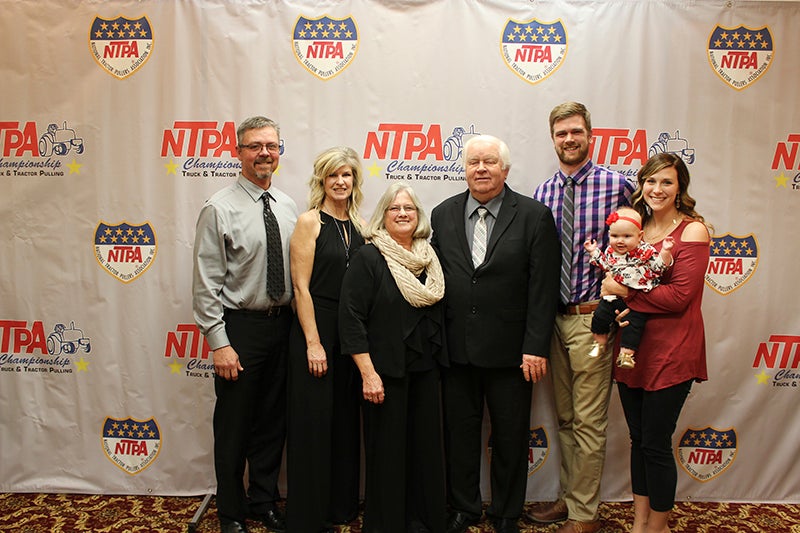 Pictured, from left, are the Lampings’ son-in-law and daughter Paul and Terri Tenold; Cindy and Ken Lamping; grandson, Andrew Tenold; his wife, Kate; and their daughter, Cora. - Provided