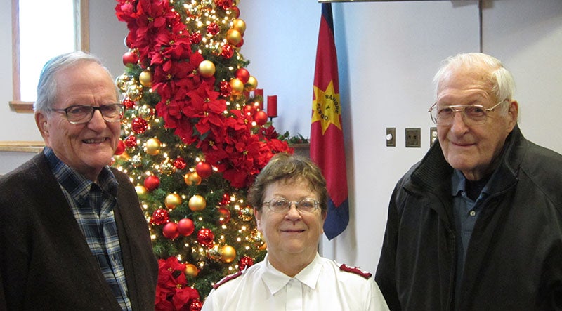 Albert Lea Western Star Lodge No. 26 members Mark Jones, left, and Robert Hahn, right, presented a donation of $500 to Maj. Elsie Cline for The Salvation Army Food Shelf. Minnesota Masonic Charities will match the amount of the donation. -Provided
