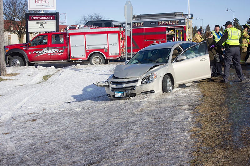 The front of a vehicle was left damaged after a crash Wednesday at the intersection of East Main Street and Prospect Avenue. — Sam Wilmes/Albert Lea Tribune