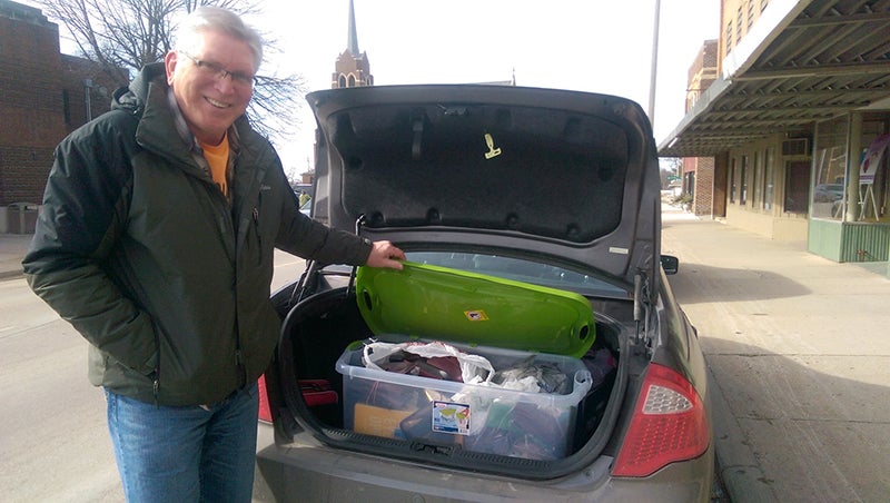 Lion Gary Schindler filled the trunk of his car with donated glasses to drop off at the Lions Convention in Mankato this weekend for its Recycle For Sight program, which distributes them to people on need. - Provided