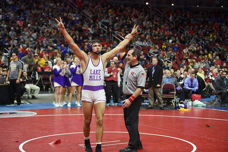 Slade Sifuentes gets his hand raised by the referee after winning his second straight state title Saturday night in Des Moines, Iowa. Lory Groe/For The Albert Lea Tribune