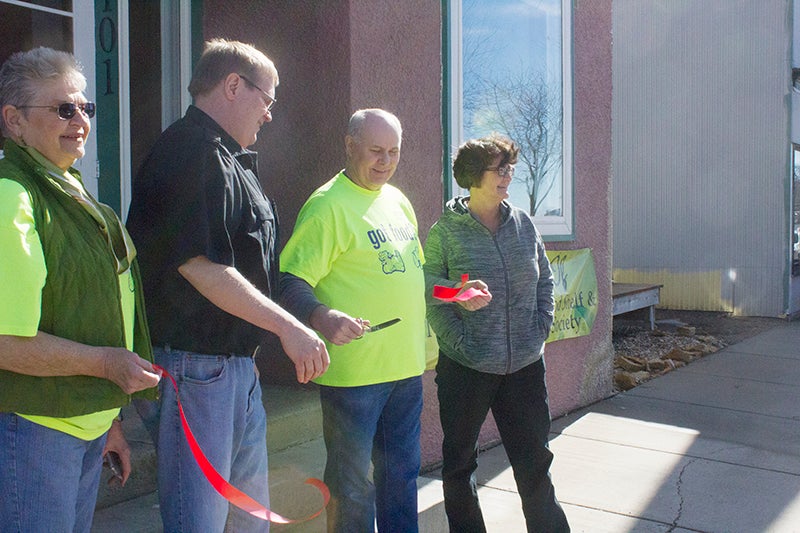 A ribbon is cut to signify the opening of the new location of the New Richland Area Food Shelf on Tuesday. — Sam Wilmes/Albert Lea Tribune